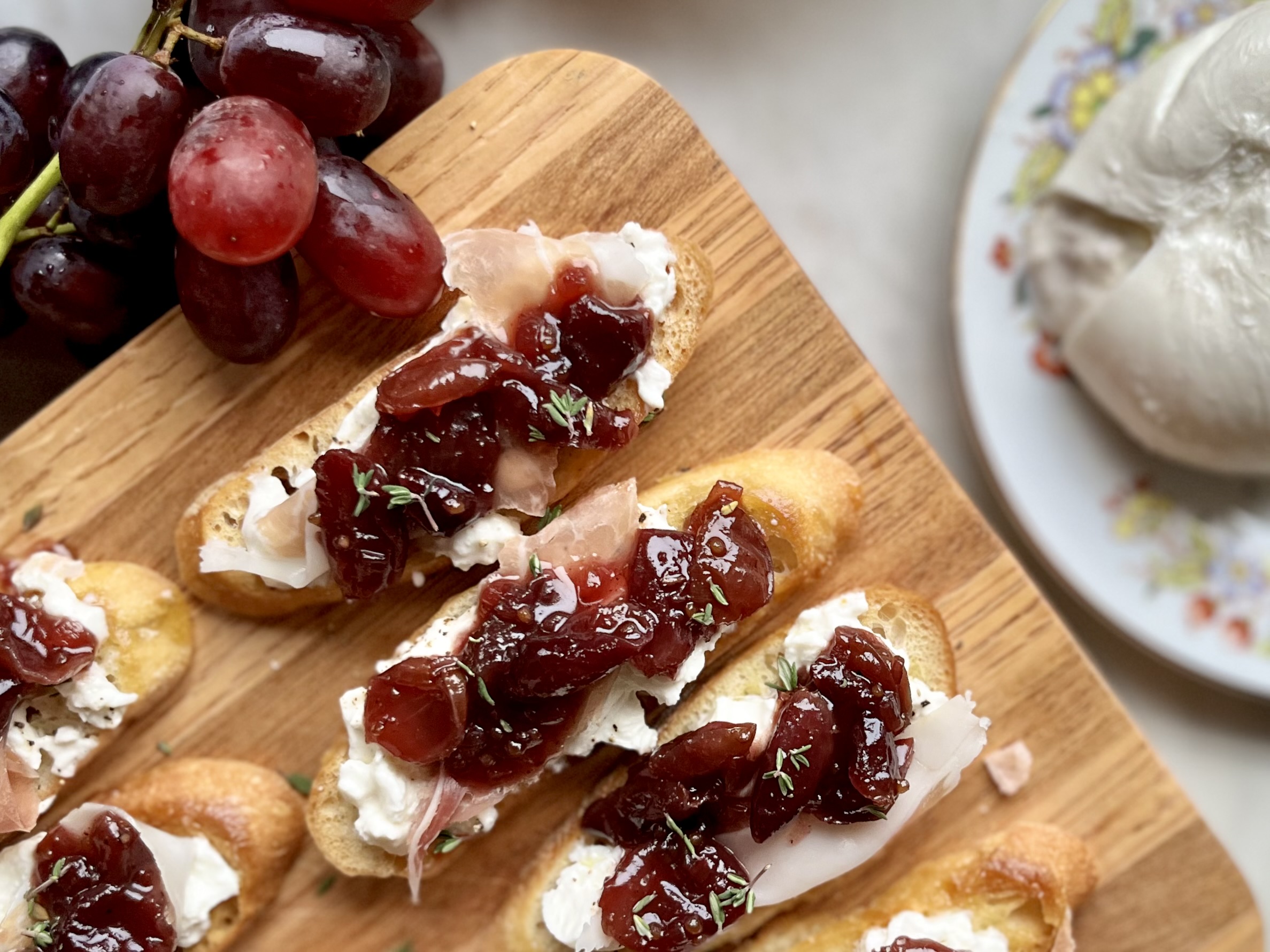 Grape Mostarda and Burrata Crostini with Prosciutto